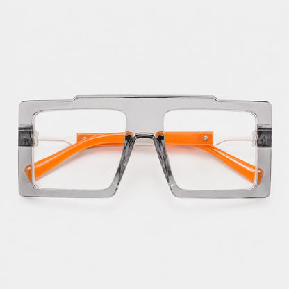 Josh & Tate - BoldFrame™ Square Glasses - A pair of oversized square sunglasses with a translucent gray frame and bright orange temples, shown against a plain white background.