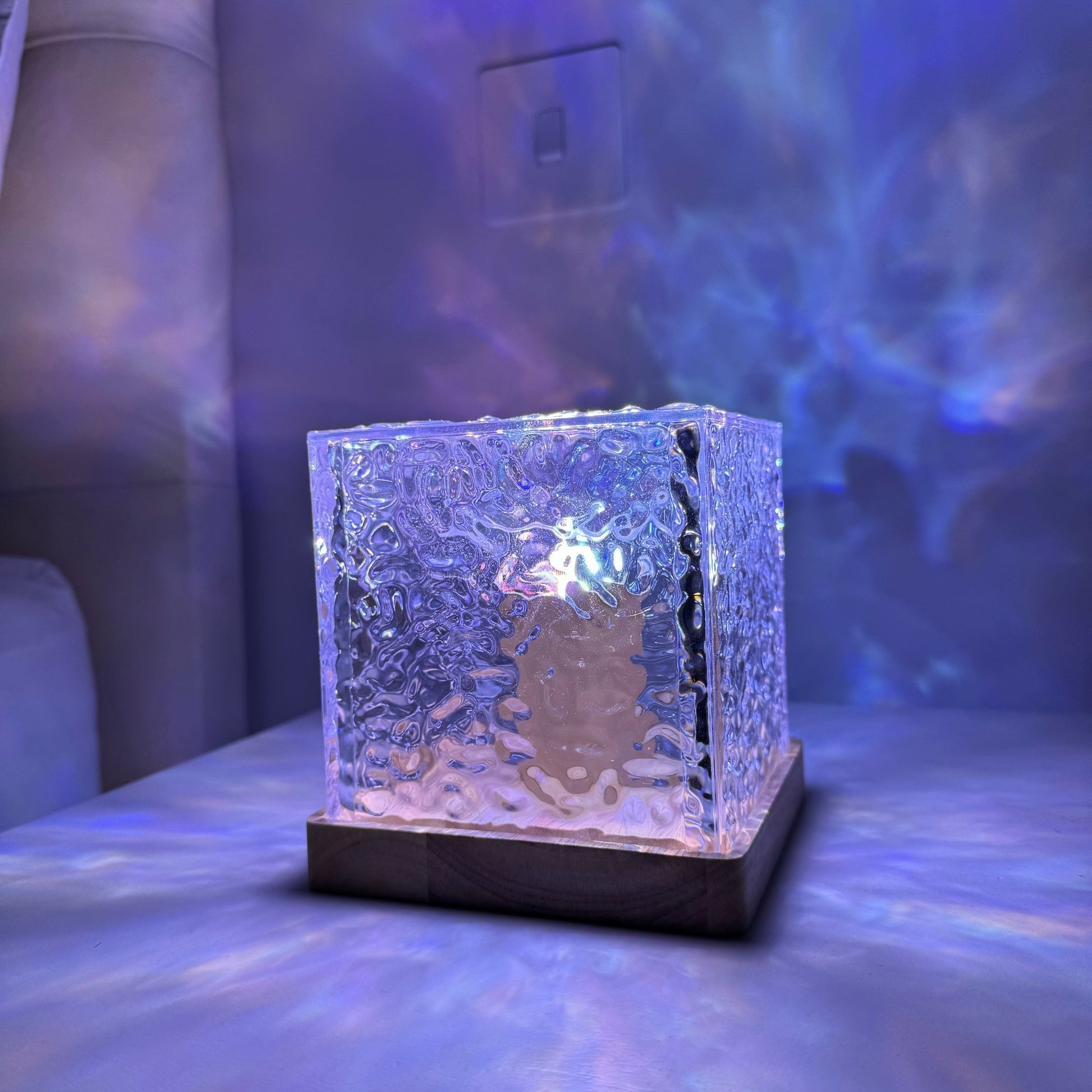 Crystal block light on a table with a blurred background