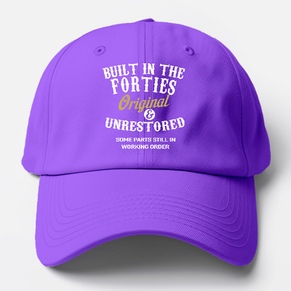 Purple cap with white and yellow text on a light gray background