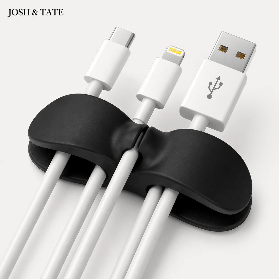 Black cable organizer holding multiple USB cables on a white background with 'JOSH & TATE' branding.