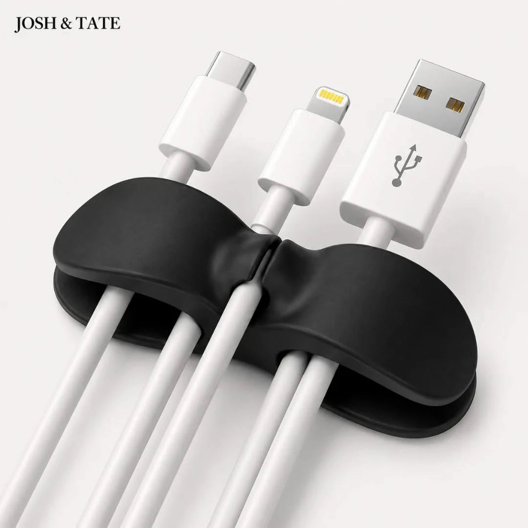 Black cable organizer holding multiple USB cables on a white background with 'JOSH & TATE' branding.