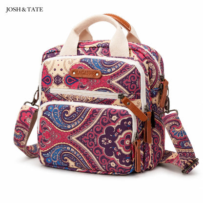 Josh & Tate - CarryAll™ Convertible Baby Bag - Multicolored patterned backpack with shoulder strap on a white background, featuring the brand 'Josh & Tate'.