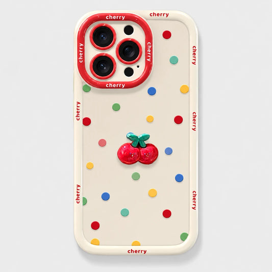 Josh & Tate - CherryPop™ iPhone Case - A cream-colored phone case with a colorful cherry-themed design, featuring a 3D red cherry embellishment in the center, multicolored confetti dots, and 'cherry' printed in red along the border and around the camera ring.