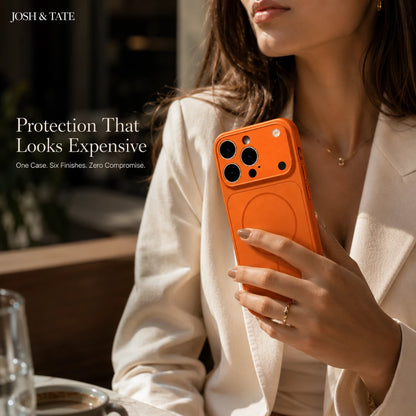 Josh & Tate - ChromeCore™ Premium MagSafe iPhone Case - Person holding an orange phone case with 'Josh & Tate' branding, text about protection, and a blurred background.