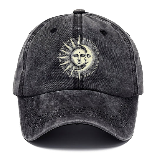 Black distressed baseball cap with a sun and moon design on a white background