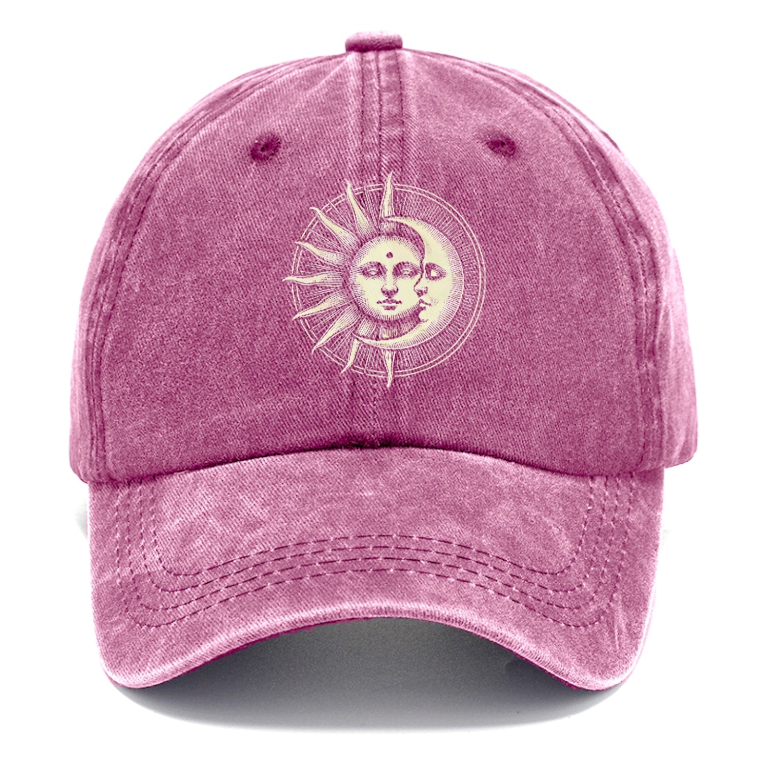 Pink cap with a sun and moon design on a white background