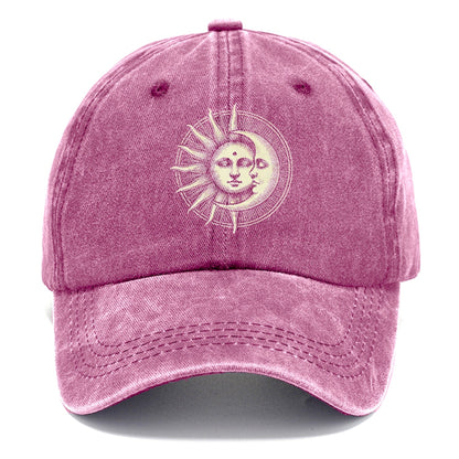 Pink cap with a sun and moon design on a white background