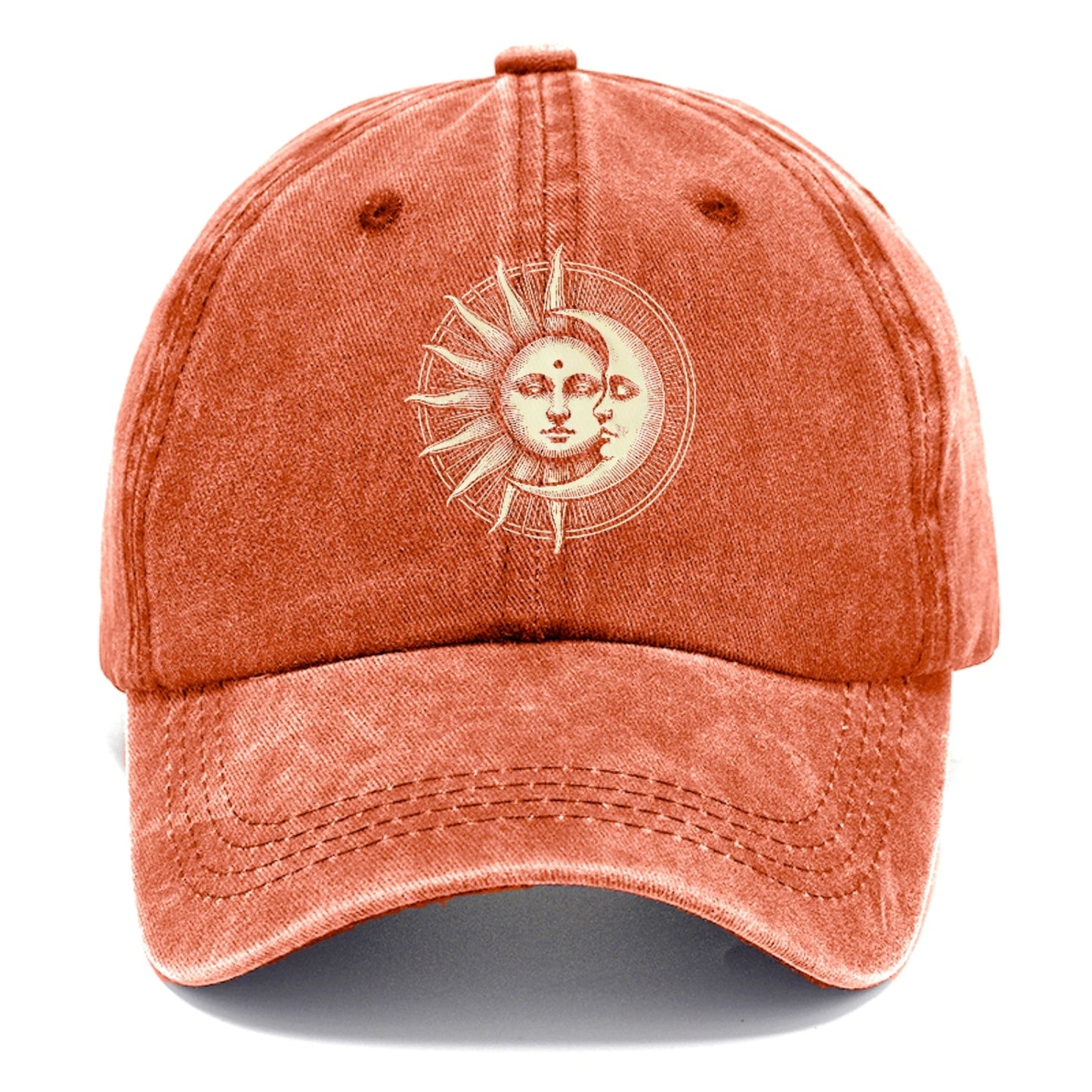 Orange cap with sun and moon design on a white background