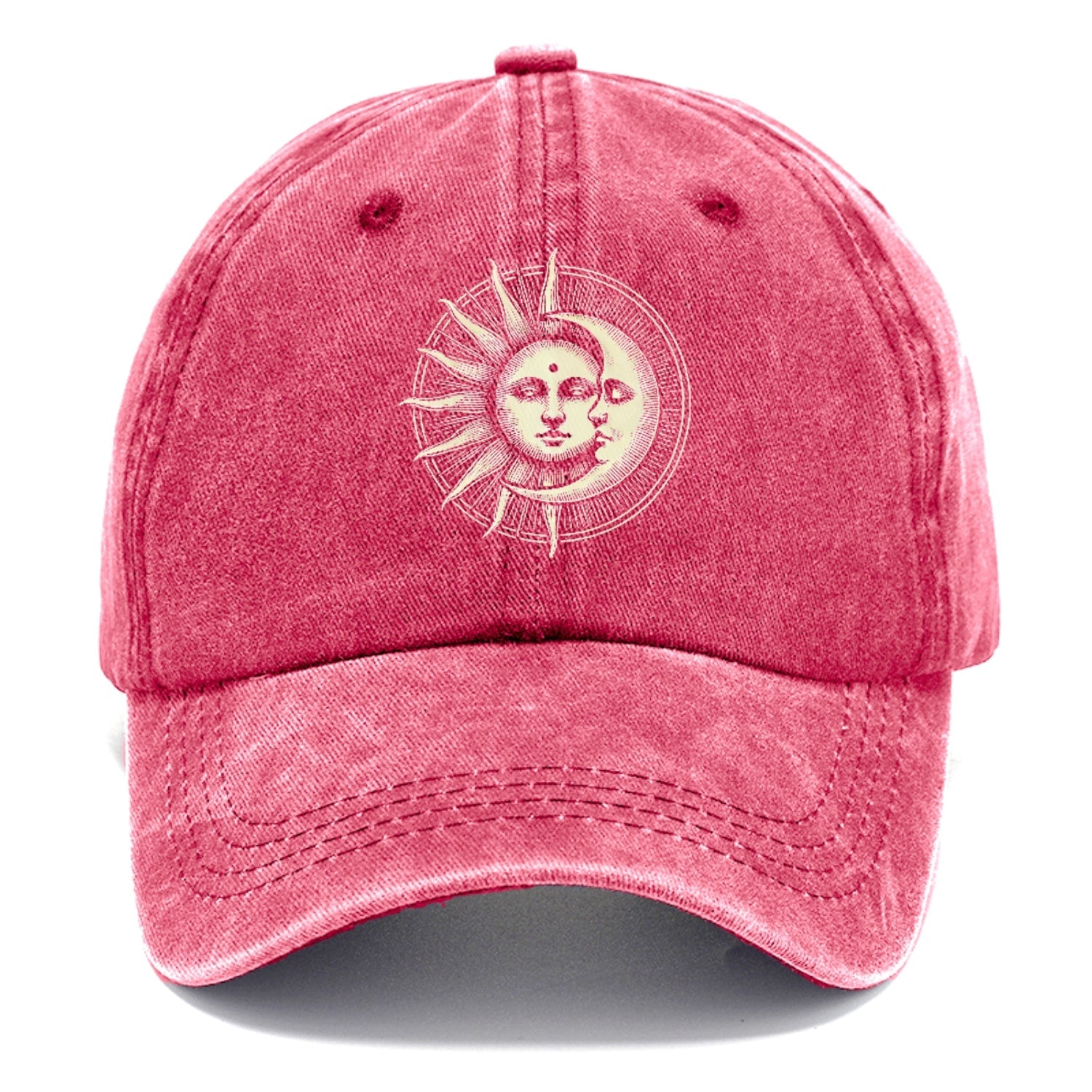 Pink cap with a sun and moon design on a white background