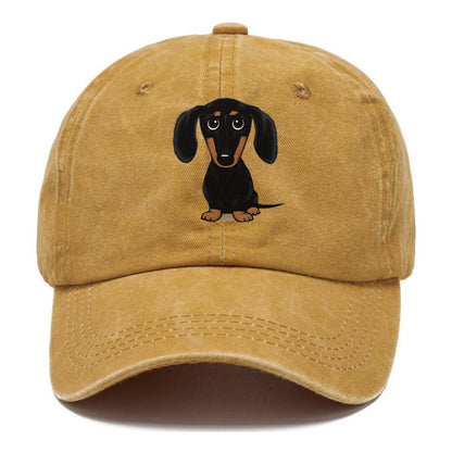 Yellow cap with a dachshund illustration on a white background