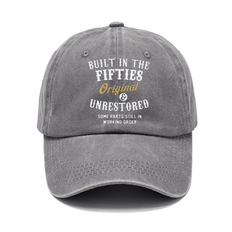 Gray cap with text 'Built in the Fifties, Original & Unrestored' on a white background