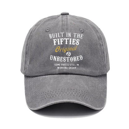 Gray cap with text 'Built in the Fifties, Original & Unrestored' on a white background