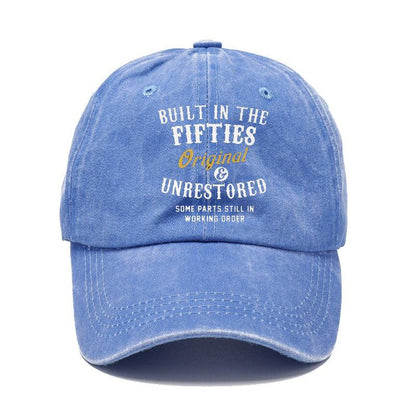 Blue cap with text 'Built in the Fifties, Original & Unrestored' on a white background