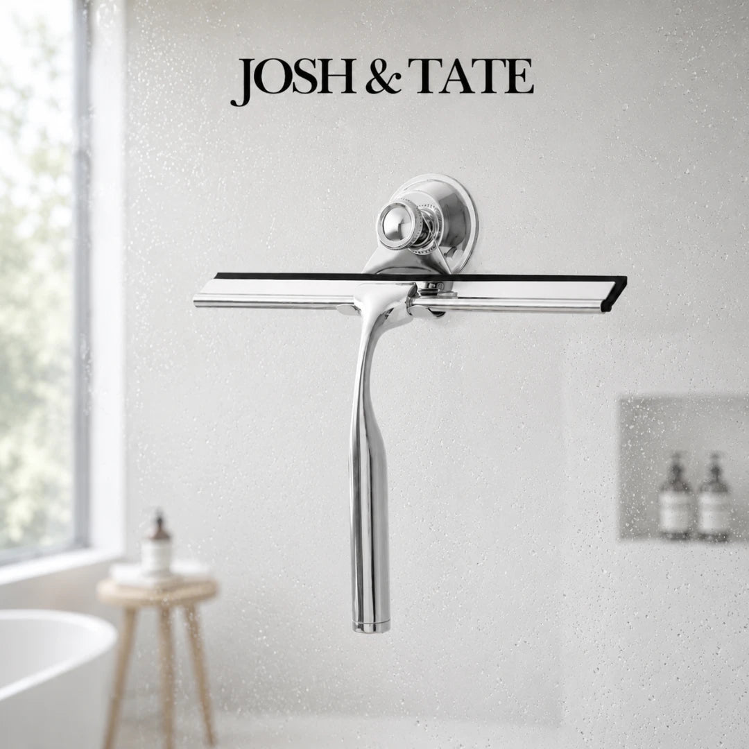 Josh & Tate - ClearSwipe™ Chrome Shower Squeegee Set - Chrome towel bar mounted on a white wall with 'Josh & Tate' branding.