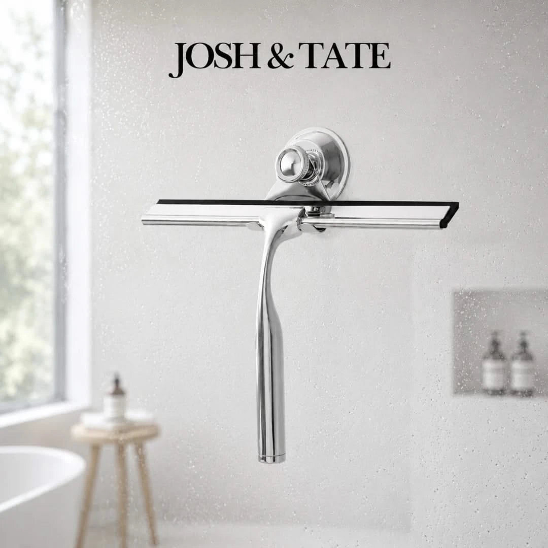 Josh & Tate - ClearSwipe™ Chrome Shower Squeegee Set - Chrome towel bar mounted on a white wall with 'Josh & Tate' branding.