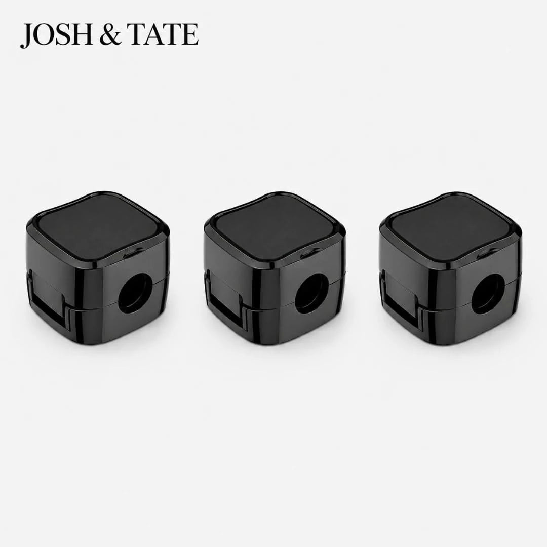 Josh & Tate - ClipCube™ Magnetic Cable Organizer - Three black pencil sharpeners on a white background with 'JOSH & TATE' branding.