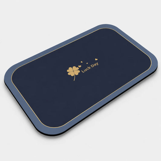 Josh & Tate - CloverDry™ Diatomite Bath Mat - Navy blue mouse pad with 'Luck Day' logo on a white background