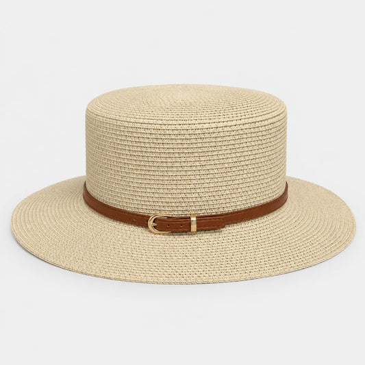 Josh & Tate - CoastBuckle™ Flat-Top Straw Hat - A light beige woven straw boater hat with a brown leather band and a gold buckle, shown against a plain light gray background.