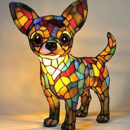 Colorful stained glass dog sculpture on a plain background
