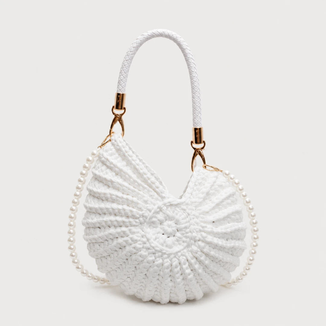 Josh & Tate - ConchKnit™ Pearl Handbag - White woven handbag with a rope handle on a light gray background