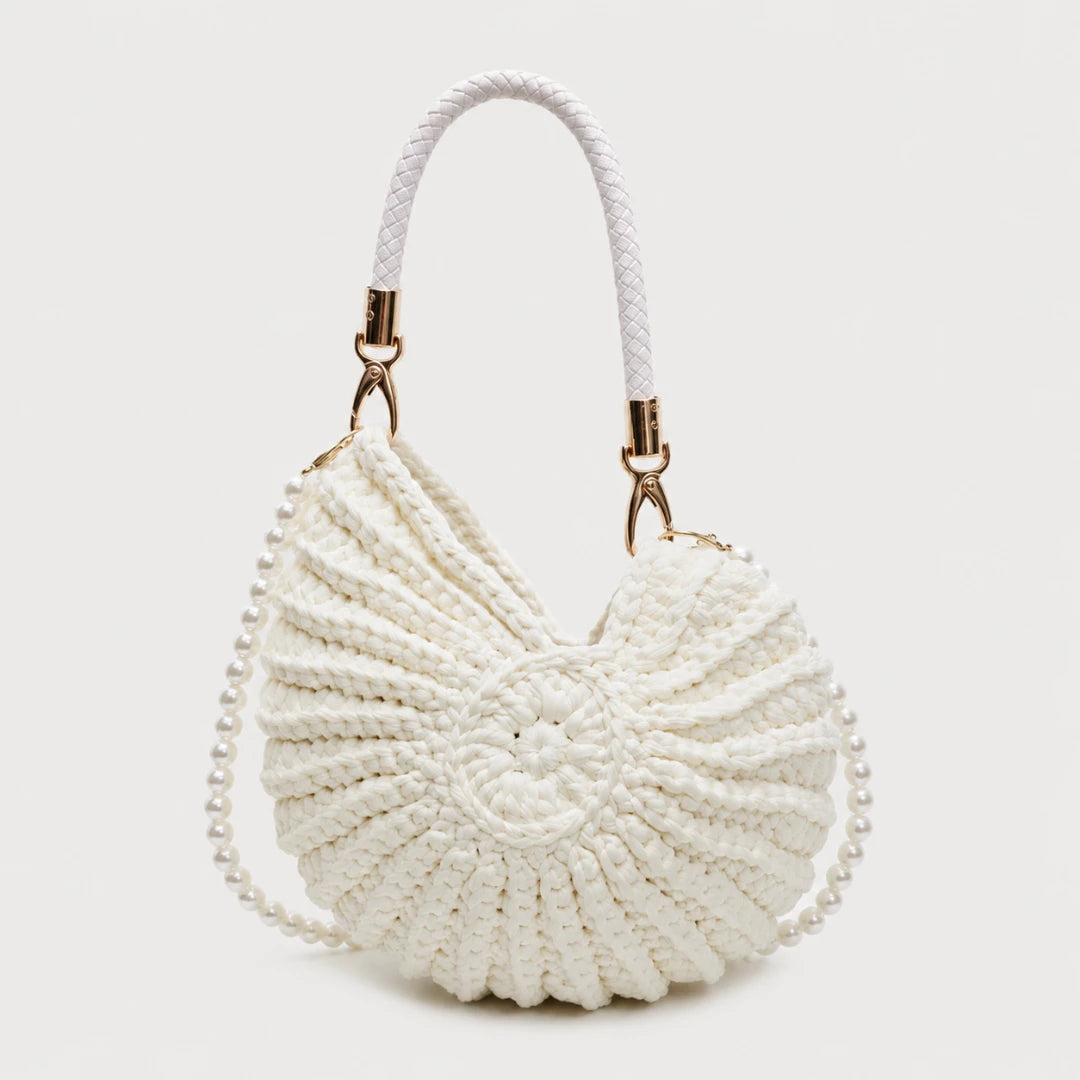 Josh & Tate - ConchKnit™ Pearl Handbag- White woven handbag with a rope handle on a light gray background