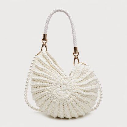 Josh & Tate - ConchKnit™ Pearl Handbag- White woven handbag with a rope handle on a light gray background