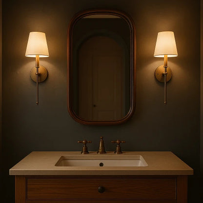Josh & Tate - Cordless Fabric Wall Light - Bathroom vanity with mirror, lights, and sink against a dark wall