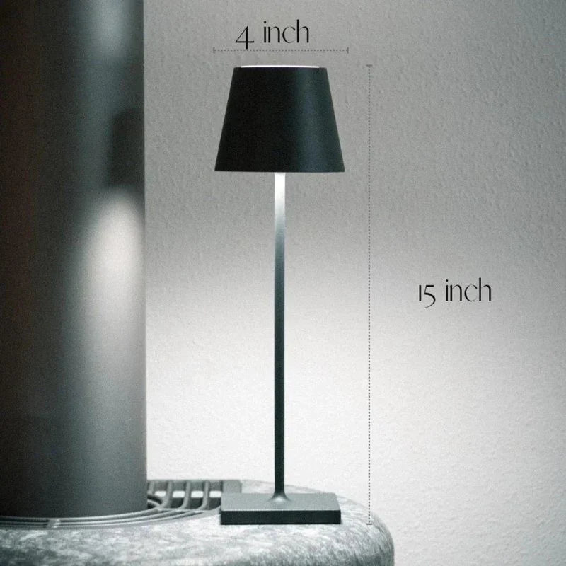 Black floor lamp with measurements on a neutral background