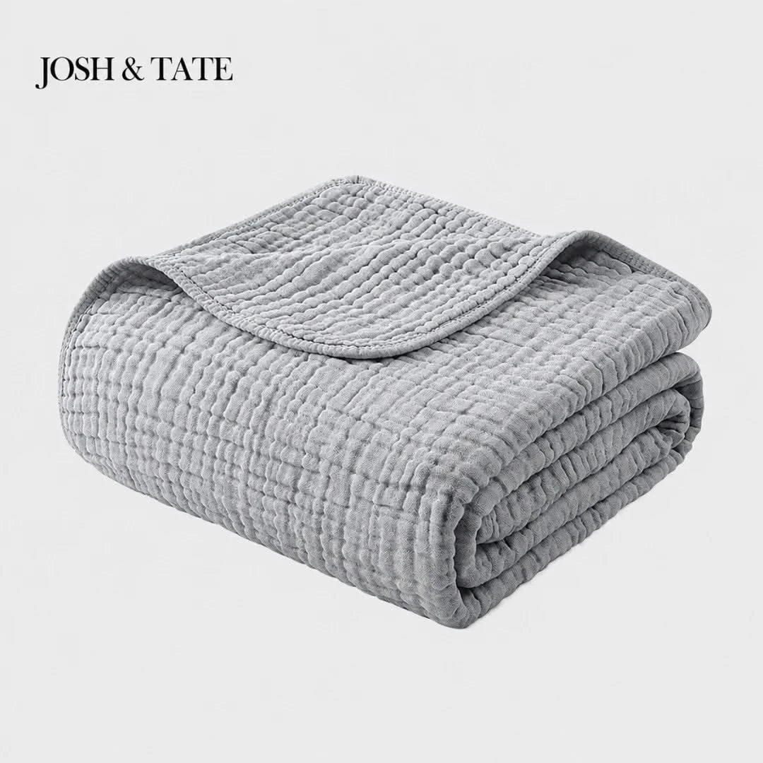Josh & Tate - CottonFold™ Thick Air Conditioner Blanket - Folded gray quilt with 'Josh & Tate' branding on a white background