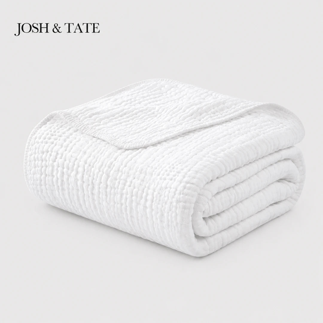 Josh & Tate - CottonFold™ Thick Air Conditioner Blanket - Folded white blanket on a light gray background with 'JOSH & TATE' branding.
