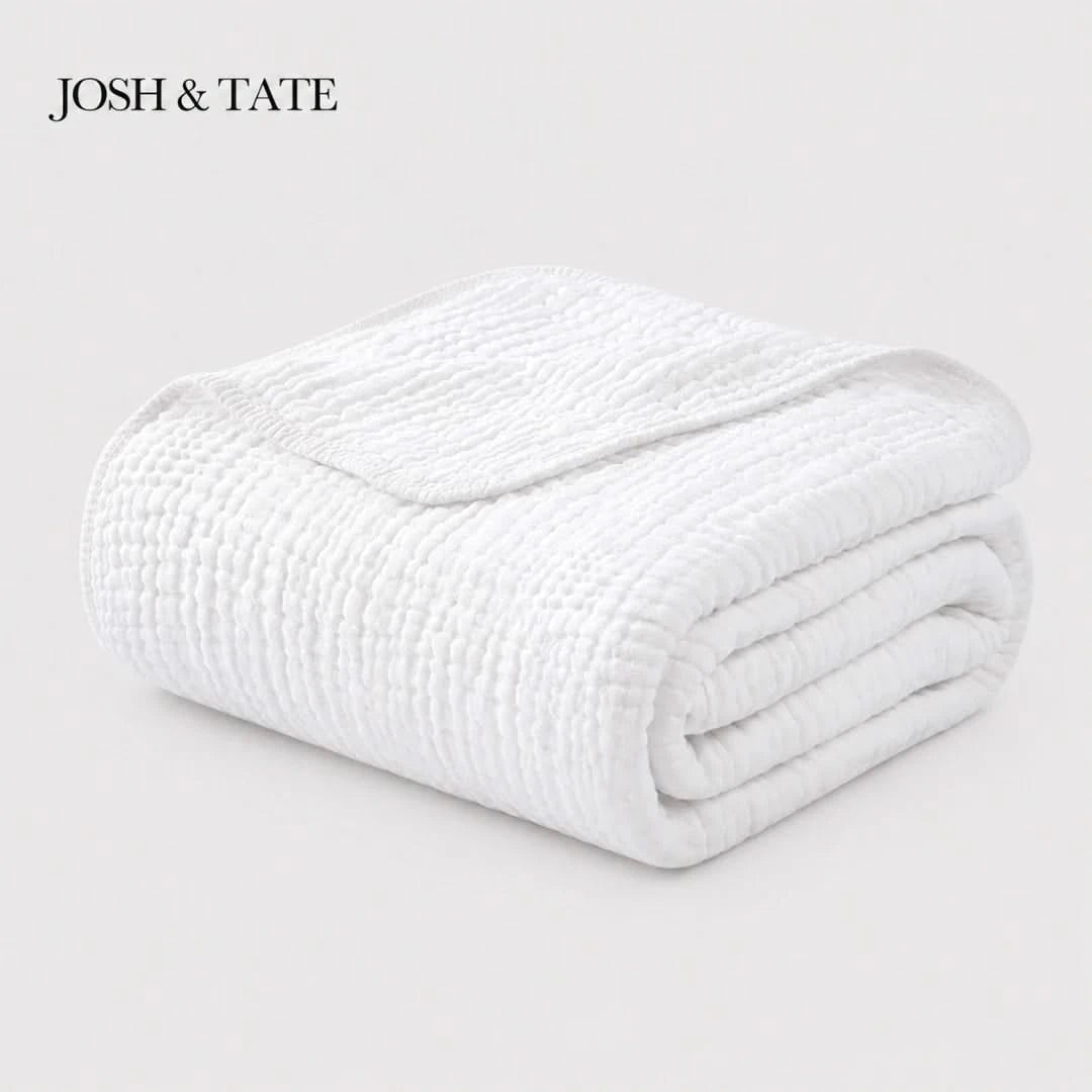 Josh & Tate - CottonFold™ Thick Air Conditioner Blanket - Folded white blanket on a light gray background with 'JOSH & TATE' branding.