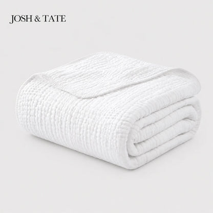 Josh & Tate - CottonFold™ Thick Air Conditioner Blanket - Folded white blanket on a light gray background with 'JOSH & TATE' branding.