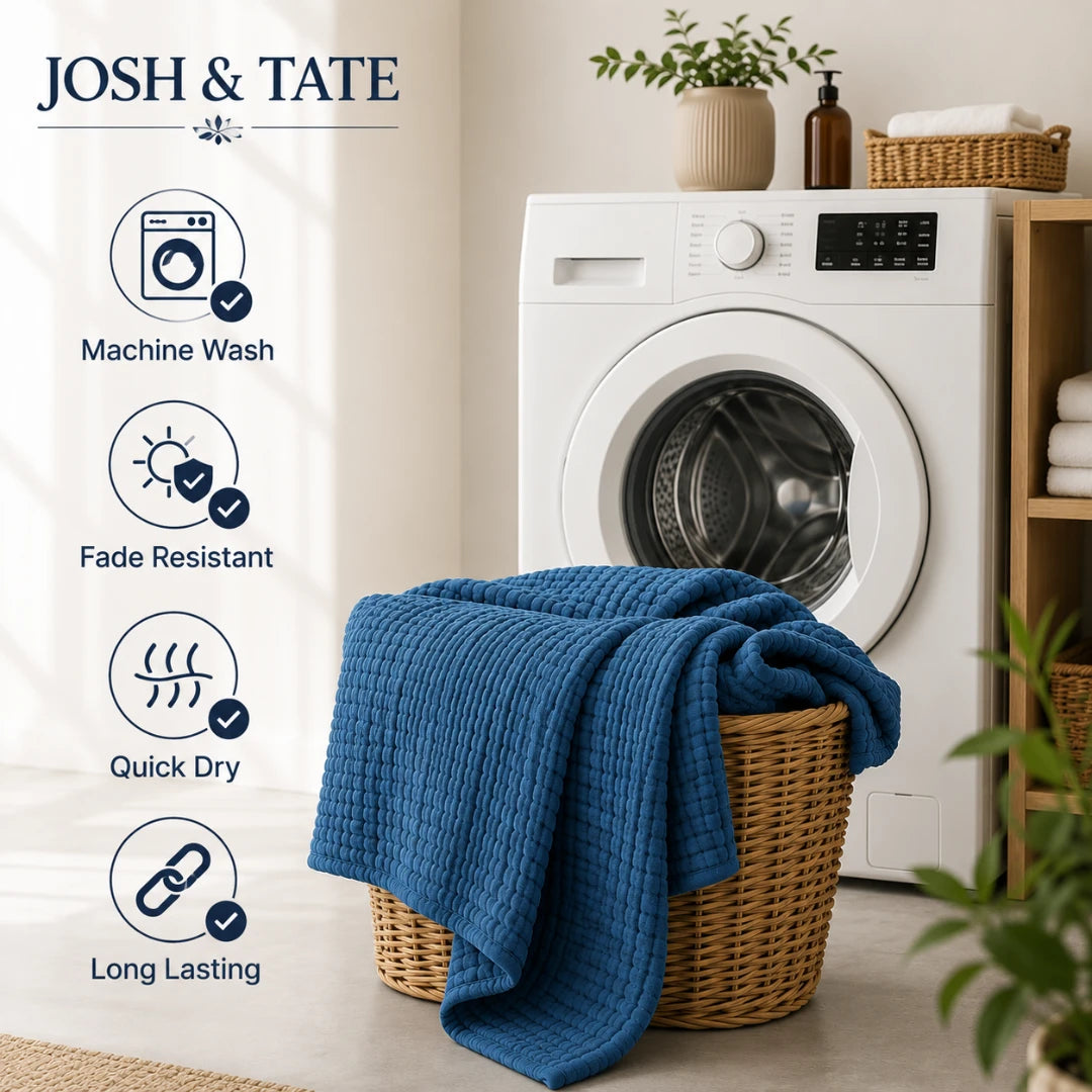 Josh & Tate - CottonFold™ Thick Air Conditioner Blanket - Blue towel in a basket in front of a washing machine with Josh & Tate branding and laundry features listed.