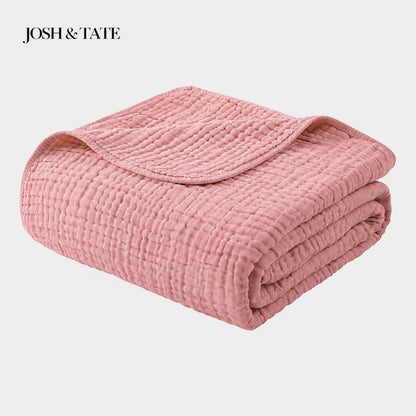 Josh & Tate - CottonFold™ Thick Air Conditioner Blanket - Folded pink quilt with 'Josh & Tate' branding on a light gray background