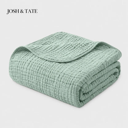 Josh & Tate - CottonFold™ Thick Air Conditioner Blanket - Folded green textured blanket with 'Josh & Tate' branding on a light gray background