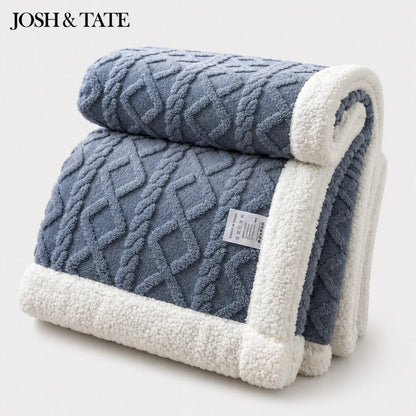 Josh & Tate - CoziKnit™ Reversible Sherpa Blanket - Blue textured blanket with white border and label on a light gray background, featuring the brand 'Josh & Tate'.