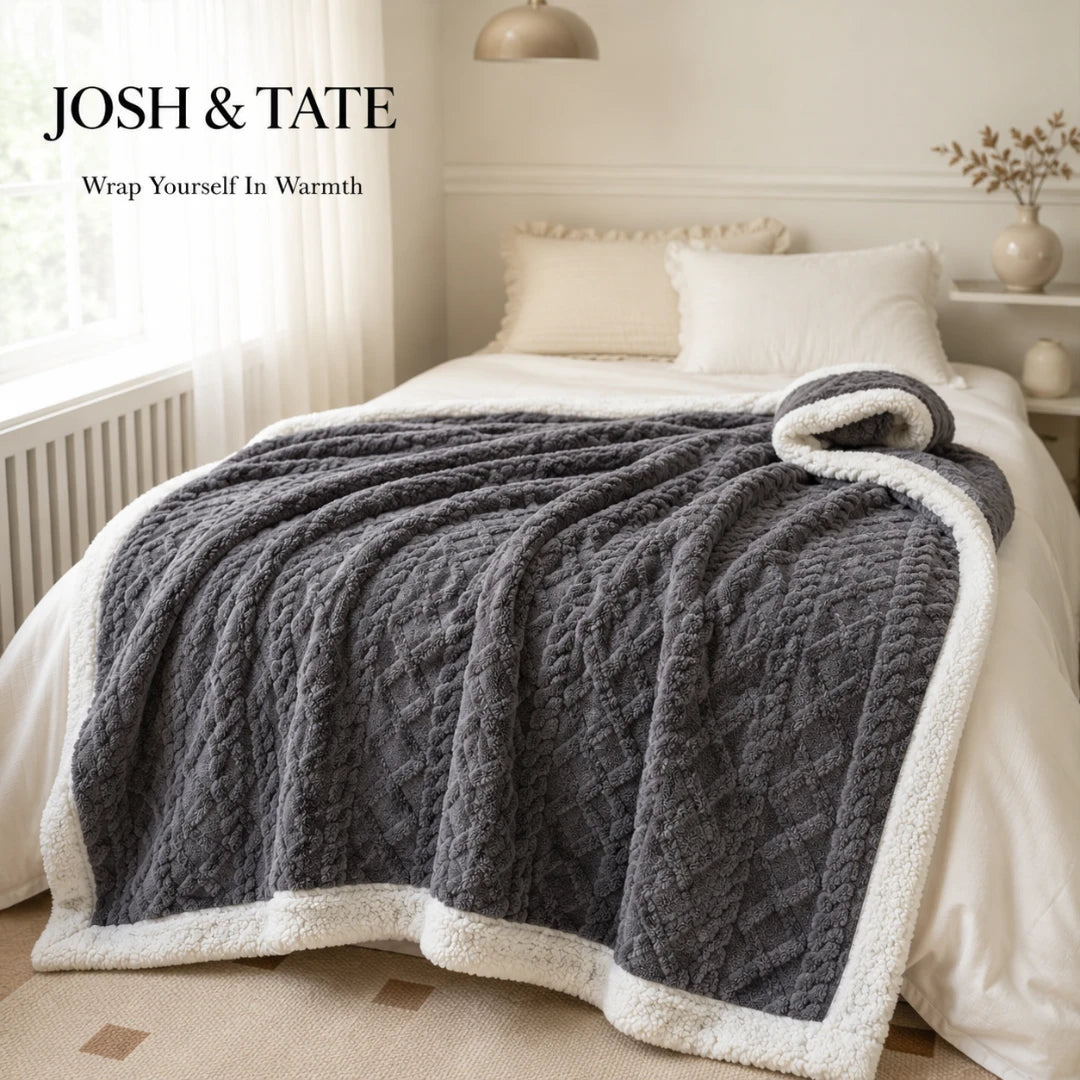 Josh & Tate - CoziKnit™ Reversible Sherpa Blanket - Gray textured blanket on a bed with 'Josh & Tate' branding in a bedroom setting.