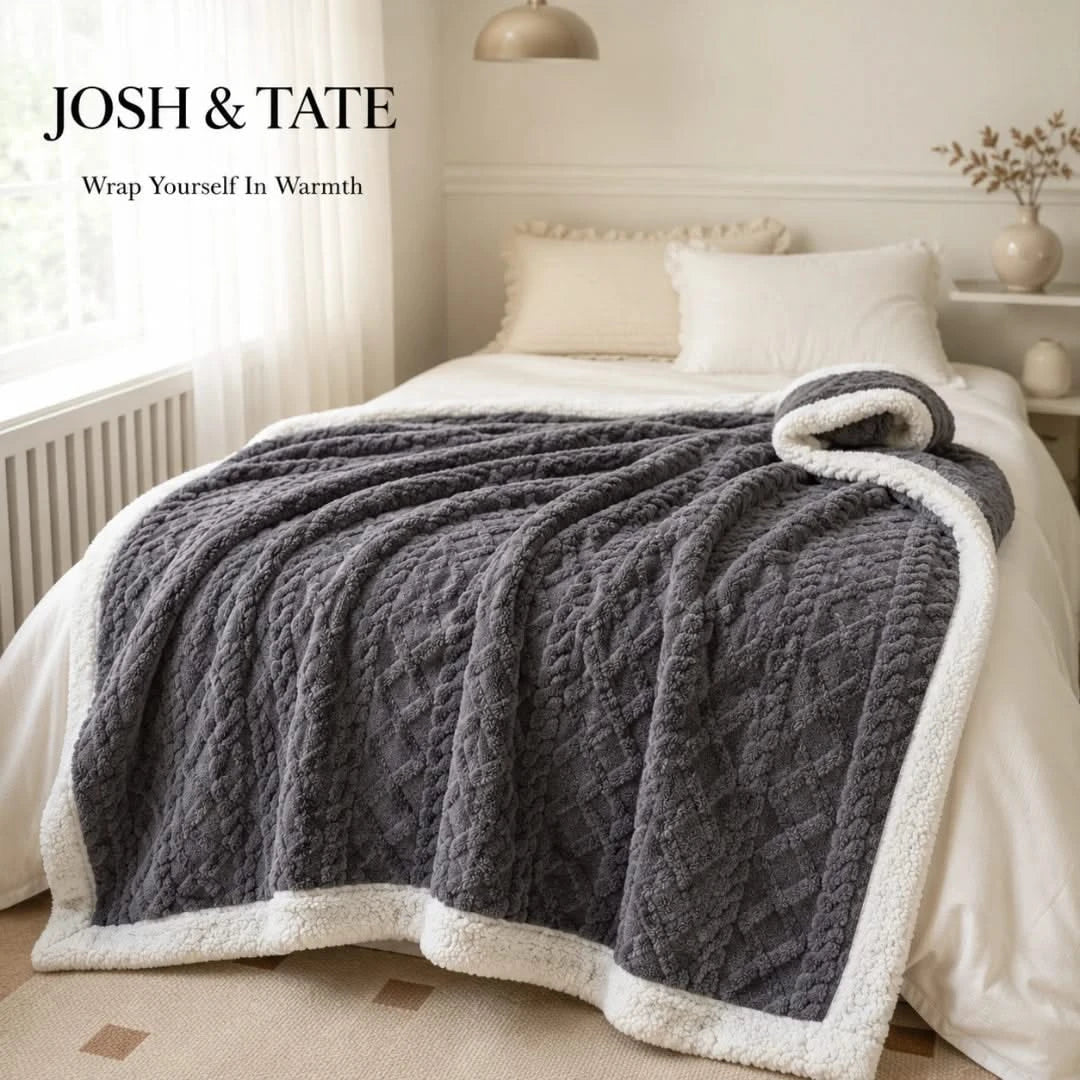 Josh & Tate - CoziKnit™ Reversible Sherpa Blanket - Gray textured blanket on a bed with 'Josh & Tate' branding in a bedroom setting.