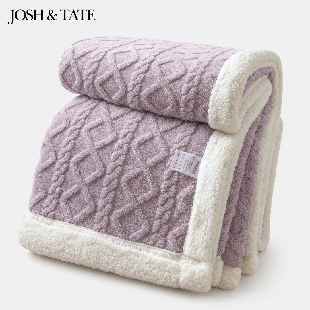 Josh & Tate - CoziKnit™ Reversible Sherpa Blanket - Folded purple textured blanket with white border on a light background, featuring the brand 'Josh & Tate'.