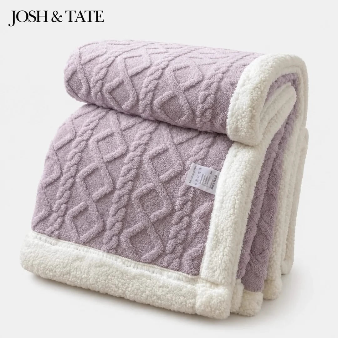 Josh & Tate - CoziKnit™ Reversible Sherpa Blanket - Folded purple textured blanket with white border on a light background, featuring the brand 'Josh & Tate'.