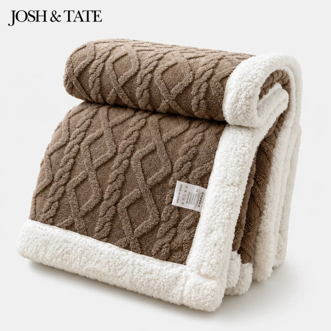 Josh & Tate - CoziKnit™ Reversible Sherpa Blanket - Folded brown and beige textured blanket with a visible label on a white background, featuring the brand 'Josh & Tate'.