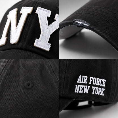 Josh & Tate - CraftWorn™ Distressed NY Cap - A black baseball cap shown in a four-panel collage, featuring large white embroidered 'NY' lettering on the front, a close-up of the brim with a distressed tear detail, and 'AIR FORCE NEW YORK' embroidered in white on the side.