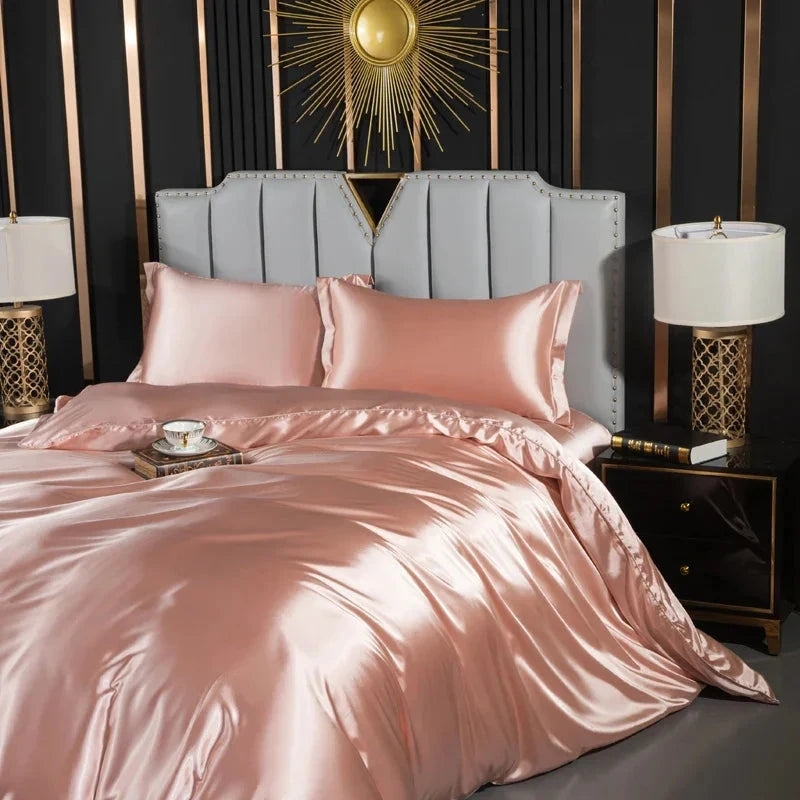 Josh & Tate - Josh & Tate - FloraStep™ Satin Fur-Lined Slipper - Pink satin bedding set on a bed with matching pillows in a stylish bedroom.