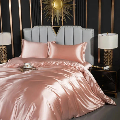 Josh & Tate - Josh & Tate - FloraStep™ Satin Fur-Lined Slipper - Pink satin bedding set on a bed with matching pillows in a stylish bedroom.