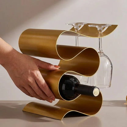 Josh & Tate CurveRack S-Wave Wine Stand - hand placing bottle showing full size