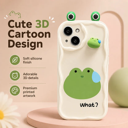Josh & Tate - CuteSilicone™ iPhone Case - A phone case with a cute cartoon frog design, featuring a large green frog face on the back, a smaller 3D frog detail on the side, and two frog eyes on the top corners. The case is shown on a pink display stand with promotional text on the left.