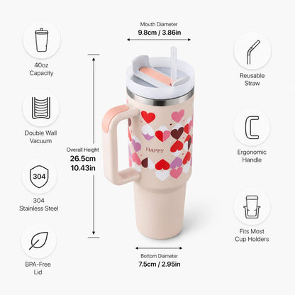A 40oz insulated travel tumbler with a heart pattern, shown with measurement callouts and feature icons on a light gray background. The tumbler has a pale pink body, a white lid, a peach-colored straw, and a silver stainless steel rim.
