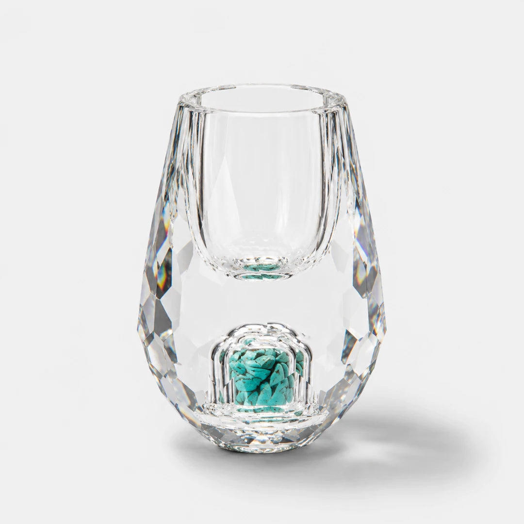 Josh & Tate - DiamondCrystal™ Shot Glass - A clear faceted glass tumbler with a small matching clear glass cup nested inside, featuring a turquoise blue decorative accent at the base, set against a light gray background.
