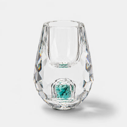 Josh & Tate - DiamondCrystal™ Shot Glass - A clear faceted glass tumbler with a small matching clear glass cup nested inside, featuring a turquoise blue decorative accent at the base, set against a light gray background.
