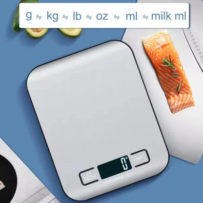Digital kitchen scale with salmon and avocado on a blue surface